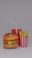 A hamburger and french fries on a table photo