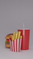 A hamburger and french fries in a red cup photo