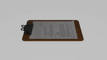 A clipboard with a piece of paper on it photo
