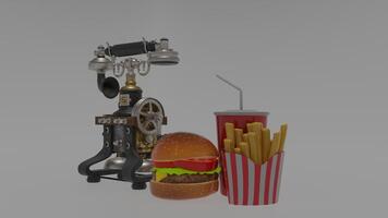 A hamburger, french fries and a soda are shown photo