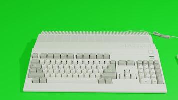 A computer keyboard and mouse on a green background photo