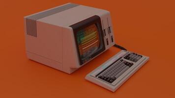 An old computer with a keyboard and mouse on an orange background photo