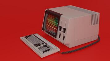 An old computer with a keyboard and mouse on a red background photo