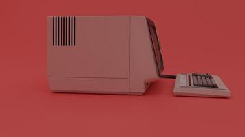 An old computer on a red background photo