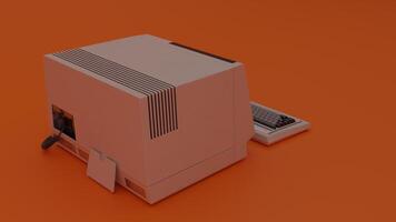 An old computer on an orange background photo