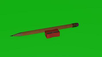 A pencil and a sharpener on a green screen photo