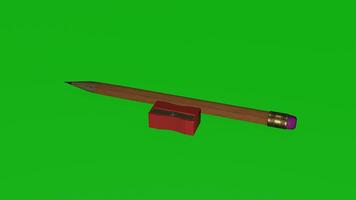 A pencil and a pencil sharpener on a green screen photo