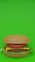 A hamburger on a green background photo