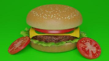 A hamburger with cheese and tomatoes on a green background photo