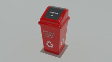 A red trash can with a sign that says push photo