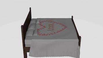 A bed with a heart on it and a pillow photo