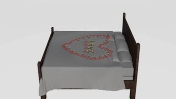 A bed with a heart on it and a pillow photo