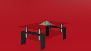 A red table with a pile of money on it photo