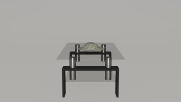 A table with a green plant on it photo
