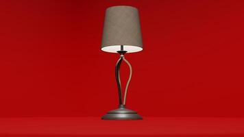 A lamp on a red background with a red background photo