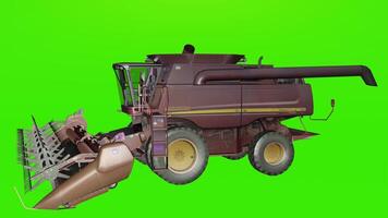 A large combine harvester on a green screen photo