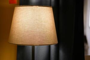 An Elegant Table Lamp that Provides Soft Light, Perfect for a Cozy Setting and Atmosphere photo