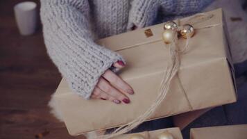 Woman with presents. Christmas woman with happy face and presents at New Year video
