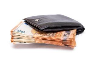 Black Leather Men Wallet with Fifty Euro Banknotes Inside - Isolated on White Background. A Purse Full of Money Symbolizing Wealth, Success and Social Status - Isolation photo