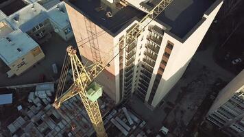 Crane for building. Crane for constructions of large building working on building video