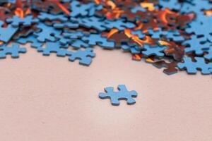 Mixed Pieces of a Colorful Jigsaw Puzzle - Strategy and Solving Problem Concept photo