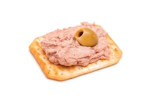 Crispy Salted Cracker with Liver Pate and Olives - Isolated on White. Easy Snack - Isolation photo