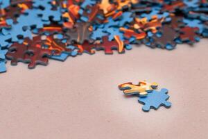 Mixed Pieces of a Colorful Jigsaw Puzzle - Strategy and Solving Problem Concept photo