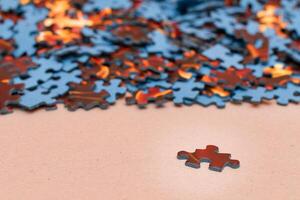 Mixed Pieces of a Colorful Jigsaw Puzzle - Strategy and Solving Problem Concept photo