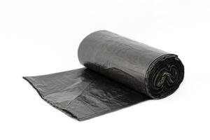 Black Polyethylene Garbage Bags on White Background - Close-Up. The Roll of Plastic Junk Package photo