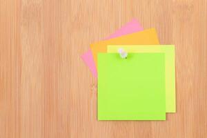 Colored Sticky Notes with Copyspace Pinned to the Wooden Message Board. To Do List Reminder in Office. Blank Memo Sticker at Work - Template. Empty Checklist - Mockup photo