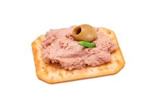 Crispy Salted Cracker with Liver Pate and Olives - Isolated on White. Easy Snack - Isolation photo