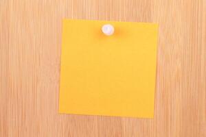 Orange Sticky Note Pinned to the Wooden Message Board. To Do List Reminder in Office. Blank Memo Sticker at Work - Template. Empty Checklist - Mockup photo