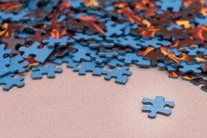 Mixed Pieces of a Colorful Jigsaw Puzzle - Strategy and Solving Problem Concept photo