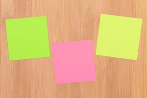 Colored Sticky Notes with Copyspace Pinned to the Wooden Message Board. To Do List Reminder in Office. Blank Memo Sticker at Work - Template. Empty Checklist - Mockup photo