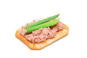 Crispy Salted Cracker with Liver Pate and Green Onions - Isolated on White. Easy Snack - Isolation photo