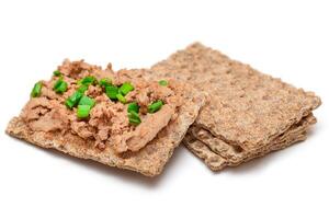 Crispy Sandwich with Chicken Pate and Green Onions Isolated on White Background - Top View. Whole Grain Bread with Liver Pate. Diet Breakfast and Healthy Food photo