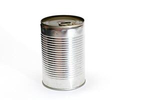 Unopened Tin Can with Blank Edge on White Background. Canned Food. Aluminum Can for Safe and Long Term Storage of Food. Steel Sealed Food Storage Container photo