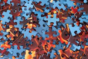 Top View of Mixed Pieces of a Jigsaw Puzzle - Texture Background photo