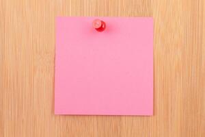 Pink Sticky Note Pinned to the Wooden Message Board. To Do List Reminder in Office. Blank Memo Sticker at Work - Template. Empty Checklist - Mockup photo