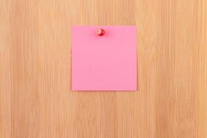 Pink Sticky Note Pinned to the Wooden Message Board. To Do List Reminder in Office. Blank Memo Sticker at Work - Template. Empty Checklist - Mockup photo
