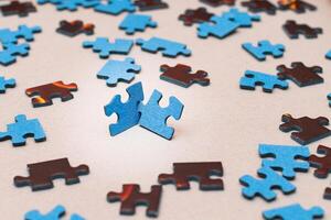 Mixed Pieces of a Colorful Jigsaw Puzzle - Strategy and Solving Problem Concept photo
