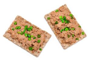 Crispy Sandwich with Chicken Pate and Green Onions Isolated on White Background - Top View. Whole Grain Bread with Liver Pate. Diet Breakfast and Healthy Food photo