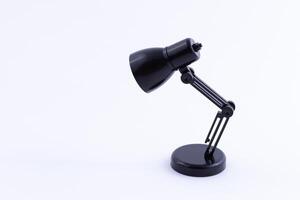 Table Lamp Mini Model. Small Black Desk Lamp on White Background photo