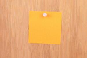 Orange Sticky Note Pinned to the Wooden Message Board. To Do List Reminder in Office. Blank Memo Sticker at Work - Template. Empty Checklist - Mockup photo