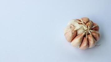 Garlic isolated on a white background. Top view. Flat lying pattern. photo