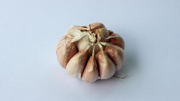 Garlic isolated on a white background. Top view. Flat lying pattern. photo