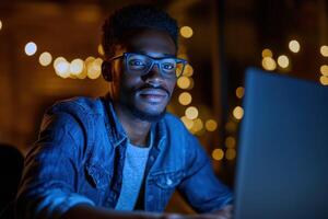 focused programmer works late at night, illuminated by glow of laptop and surrounded by soft, warm lights. atmosphere is creative and inspiring photo