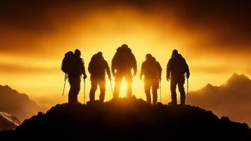 Adventurous climbers stand silhouetted against stunning sunset, showcasing their determination and camaraderie. breathtaking mountain landscape enhances emotional impact of their journey photo