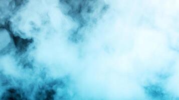 Misty blue smoke fills frame, creating serene and ethereal atmosphere. soft, swirling patterns evoke sense of calm and mystery, perfect for various creative projects photo