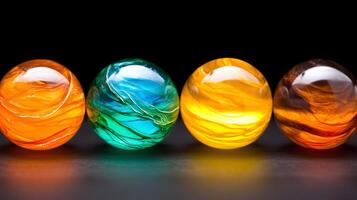 Colorful glass marbles in vibrant hues of orange, blue, and yellow create striking visual display, showcasing their unique swirls and patterns photo